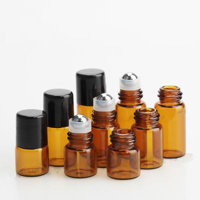 China Personal Care 100pcs/lot 3ml 5ml Amber Roll On Bottles Essential Oil Ball Glass Bottle Refillable Bottles for sale