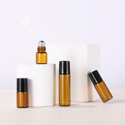 China Personal Care 100pcs/lot 1ml 2ml Amber Roll On Bottles Essential Oil Ball Glass Bottle Refillable Bottles for sale