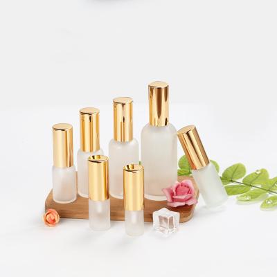 China 5-100ml Forst Pump Mist Spray Cosmetic Perfume Bottle With Gold Aluminum Lid Matte Lotion Glass Bottle Cosmetic Refillable Bottle for sale