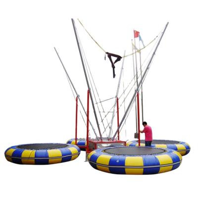 China Galvanized Steel+spring+pp Portable Amusement Park 4 People In 1 Trailer Mounted Bungee Jumping Trampoline Price for sale