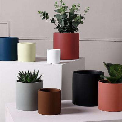 China Contemporary Custom Nordic Matte Glazed White Ceramic Pots Wholesale Planting Flower Pots With Bases for sale