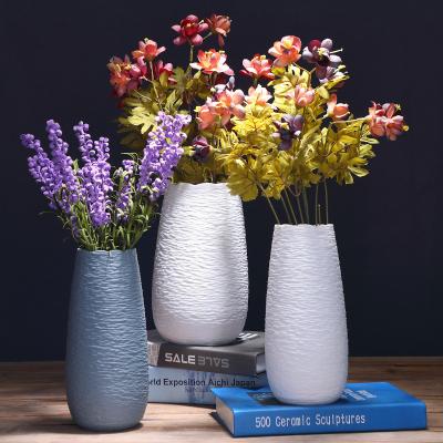 China Contemporary Hot Creative Ceramic Small Vase Simple Ceramic Home Living Room Ornaments Vase for sale