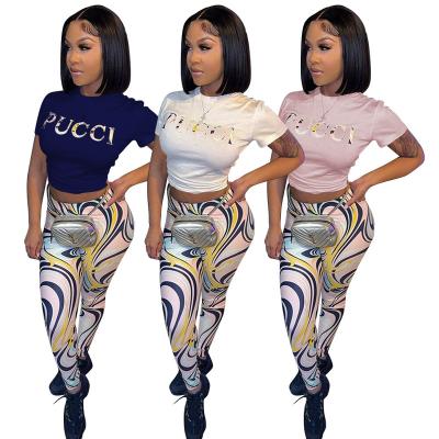 China New Arrival Summer QUICK DRY Letter Printed Casual Clothing Amenities T-shirt Two Piece Set Crop Top Slim Fit Crop Top Sleeve Women 2 Piece Set for sale