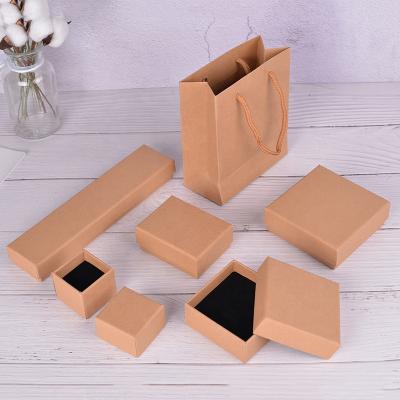 China Custom Recyclable Logo Kraft Paper Jewelry Box Packaging Box Wristlet Box Gift Handbags Cardboard Takeout Cardboard for sale