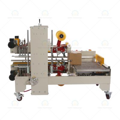 China Production Line Factory Direct Sales High Efficiency Carton Sealing Machine Four-Corner Sealing Machine for sale