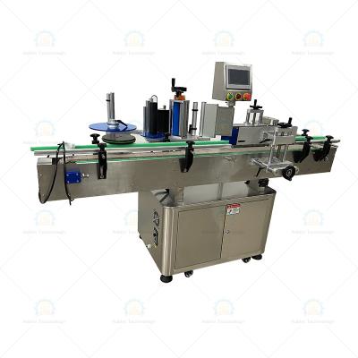 China Automatic Food Rolling Round Bottle Labeling Machine Hot Selling Products for sale