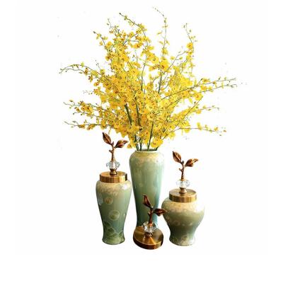 China Modern Home Ornament Brass Green Leaf Decorative Porcelain Ceramic Vase for sale