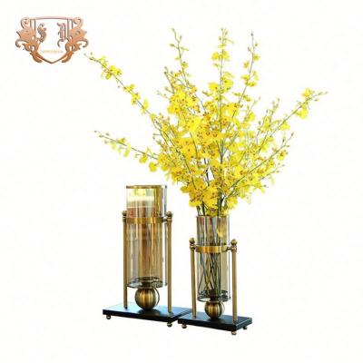 China Modern Unique Cylinder Shaped Glass Vase For Home Decor With Metal for sale