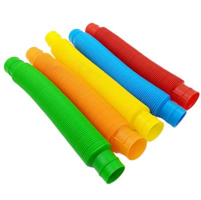 China Newest Telescopic Bellows Toy Pop Tubes Plastic Color Stretched Plastic Pipe Toy for sale