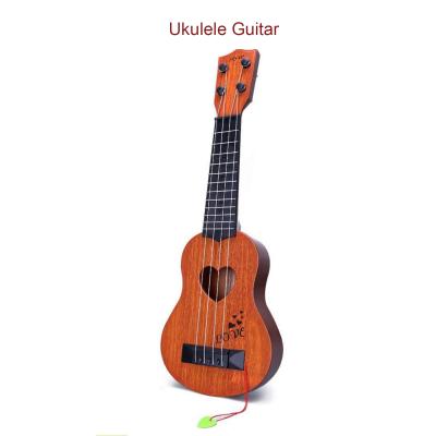 China Fashion style light wood grain simulation cheap kids play plastic ukulele guitar for beginner made in china for sale