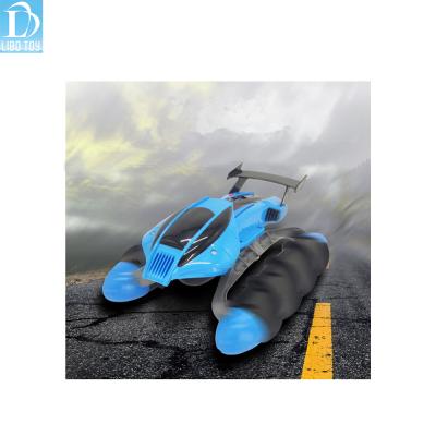 China RC Model 2.4 GHz RC Toys 4WD Amphibious Tank Toy RC Stunt Remote Control Car All Terrain Water Toy For Kids for sale