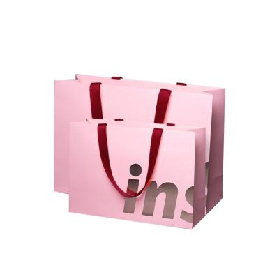 China Wholesale Recycled Materials China Package Goil Foil Custom Logo Shopping Custom Paper Bag Packaging for sale