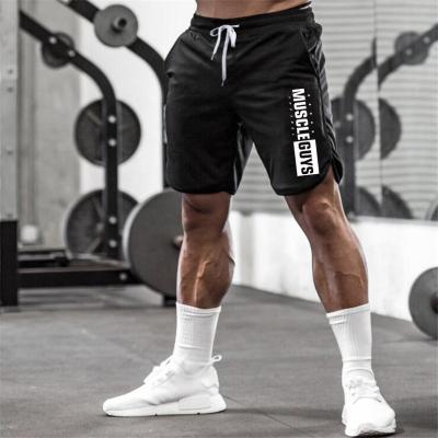 China Anti-Wrinkle Mens Training Sports Shorts Custom Workout Compression Mens Fitness Running Pants Mid Solid 100% Polyester Shorts With Pocket for sale