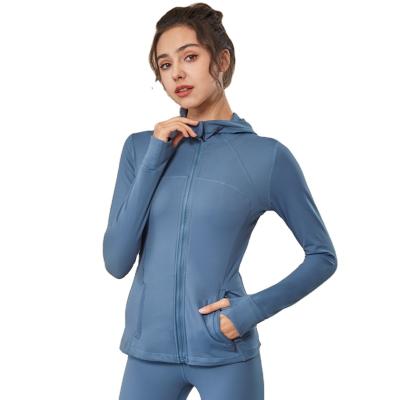 China Autumn and winter sportswear fitness breathable bare hooded clothing European and American women's tight long sleeve zipper yoga clothes for sale