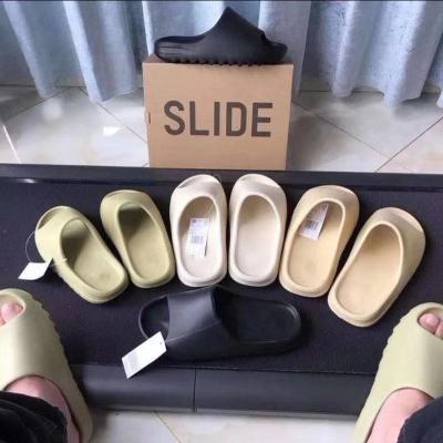 China CUSHIONING Unisex Yeezy Bone Slides 2021 Summer Beach Luxury Brand Yeezi Slides Custom Anti Slip Women for sale