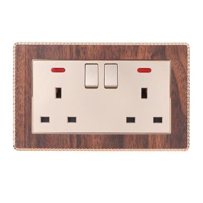 China Fashion Simplicity China Manufacture 2*13A Double Switch Wood Grain Gold Professional Electrical Wall Switch for sale