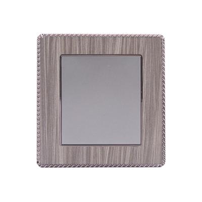 China Residential Factory Price 1gang 1way Wall Mount European Standard Panel With Light Wall Switch And Socket for sale