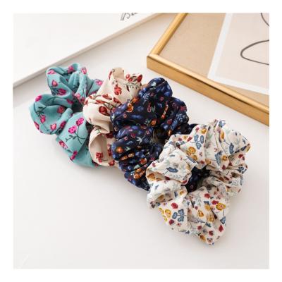 China Hot Selling Soft Custom Wholesale Good Quality Link Scrunchie Holdwr Hair Bun Scrunchies for sale