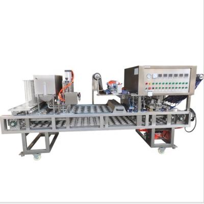 China Food Yogurt Milk Water Cups Sealing Filling Machine for sale