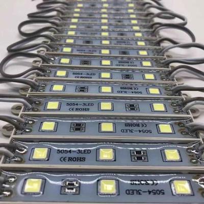 China Desktop decoration 12v outdoor full color 5054 3 lens ws2811 5050 smd 5054 3 led chips light module rgb led module for sale