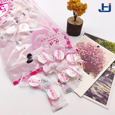 China Factory Wholesale Compressed Spunlace Nonwoven Coin Mini Magic Compressed Mask for sale