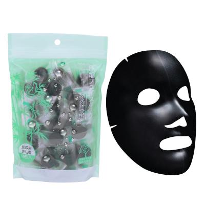 China Zhejiang factory offer 1-3 layer folding service bamboo fiber nonwoven fabric face mask charcoal sheet/mask cloth black sheet for sale