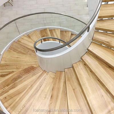 China Modern Indoor Steel Structure Wooden Tread Curved Stairs With Riser Foshan Factory Open Spiral Staircase for sale