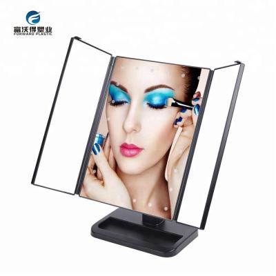 China Portable Adjustable Makeup Mirror Touch Screen LED Magnifying Tabletop Cosmetic Folding 16 LED Lights Mirror for sale