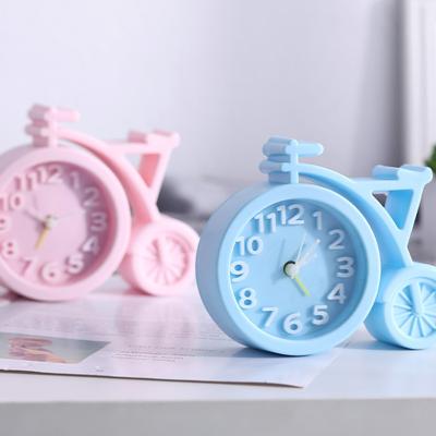 China Creative children's alarm clock antique Arabic shape small bicycle style alarm clock home bedroom dormitory digital bedside decoration for sale