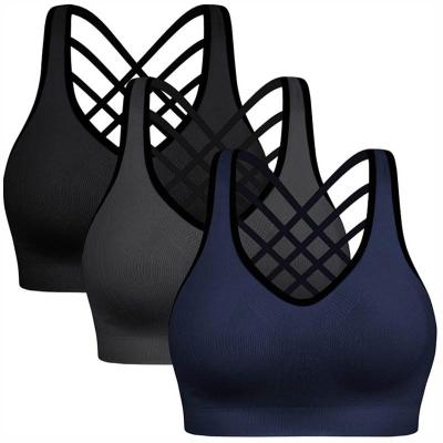 China Breathable Logo Seamless Medium Support Yoga Sports Bra Custom Cross Support Wireless Removable Cups for sale