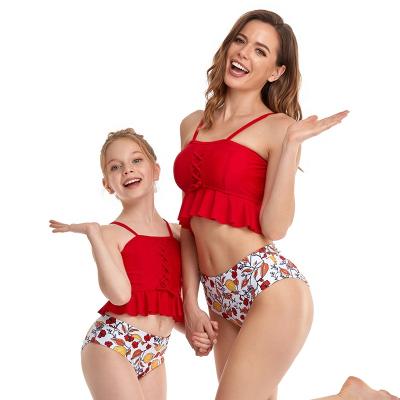 China 2021 Breathable Ruffles Crop Floral Spaghetti Straps Cross Swimsuit Mom I Set Beach Outfit Family Mom And Daughter Matching Swimwear for sale