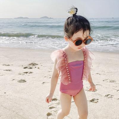 China 2021 Amazon INS Breathable Ruffles Flounce Pearl Jumpsuit Princess Tutu Skirt Bathing Suit Child Swimsuit Babies One Piece Swimwear for sale