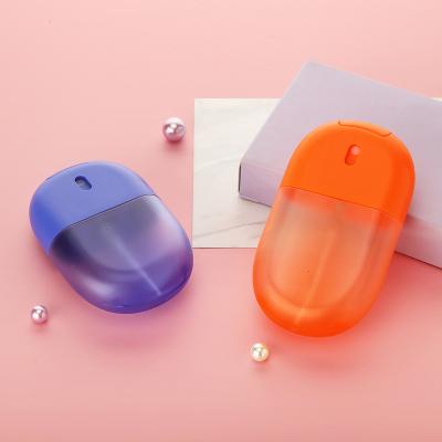 China 2022 New Design Round Shape 30ml 40ml 50ml Perfume Hand Sanitizer Empty Blue Orange Refillable Mist Spray Bottle From Personal Care for sale