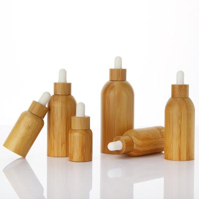 China Manufacturer Wholesale Custom Cosmetic 15ml 30ml 3.5oz Empty Bamboo Glass Bottle With Dropper Tip White Bamboo for sale