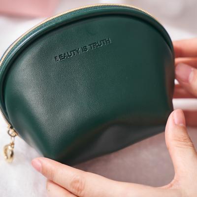 China Small Travel PU Cosmetic Bag Waterproof Promotional Faux Leather Women Gift Leather Storage Customize Makeup Recycled PU Cosmetic Travel Bag for sale