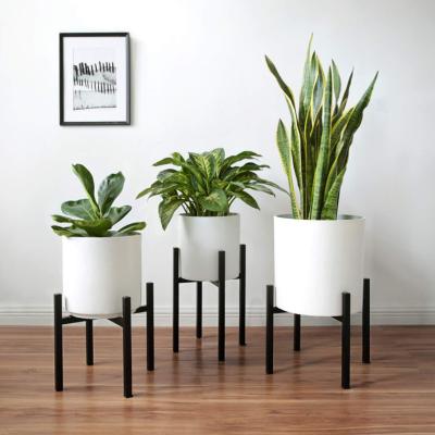 China Mid Century Modern Home Decor Plant Stand Display Rack Mid Century Modern Home Decor Adjustable Indoor Metal Plant Stand Wrought Iron Flower Pot Metal Plant Stand Black for sale