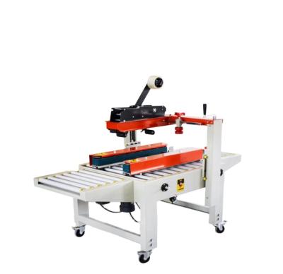 China FXJ-6050 Automatic Food E-commerce Carton Sealing Machine Paper Case Sealer for sale