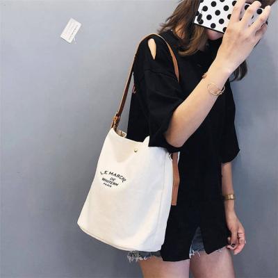 China Hot Selling Canvas Handled 16OZ Cotton Bags Tote Bag With PU Leather Strap for sale