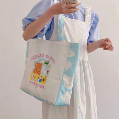 China Cute gift bag large capacity canvas cartoon printing shopping bag cotton fabric bag for female student for sale