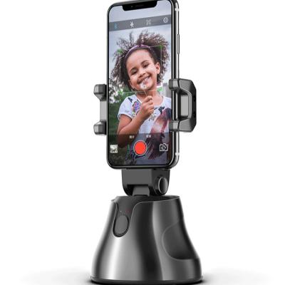 China 360 Degree Rotation Adjustable Smart Phone Holder Automatic Selfie Face Tracking Cell Phone Holders for sale