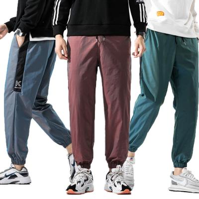 China KEROSENE Calca Moletom Polyester Anti-pilling Track Pants Men Cargo Reflective Sport Tracksuit Loose Casual for sale