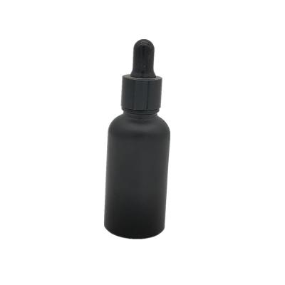 China Recyclable Wholesale Cosmetic Container Dropper Bottle Essential Oil Black Matte Glass Bottle Eco-friendly With Hot Stamping for sale