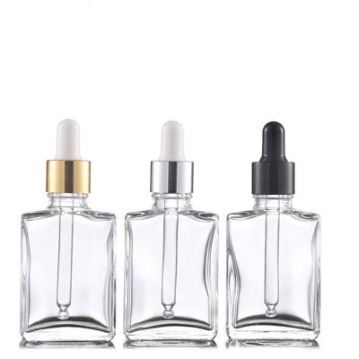 China Eco-friendly Recyclable High Quality Square Clear Glass Dropper Bottles Rectangle 30ml Glass Dropper Bottles With Gold Cap For Essential Oil for sale