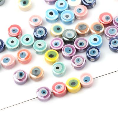 China DIY Flat Round Shape Colorful Ceramic Beads Evil Eye Beads For Jewelry Making Ojo Beads Charms for sale