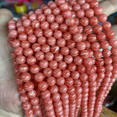 China Synthetic Rhodochrosite Alternative Stripe Argentina Rhdochrosite 4/6/8/10mm Polished Smooth Loose Round Red Beads for sale