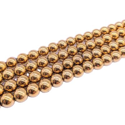 China Beads Strand New Process Plated Tier-5A Gold Plated Natural Hematite Beads for sale