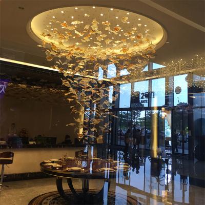 China Custom Modern Long Staircase Modern Wedding Club Hotel Lobby Leaf Shape Luxury Led Chandelier for sale