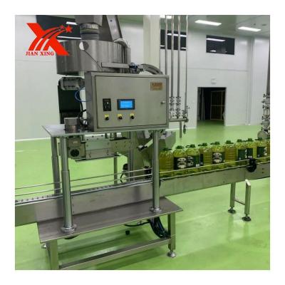 China Food China Factory PET Bottle Close Capsule Machine for sale