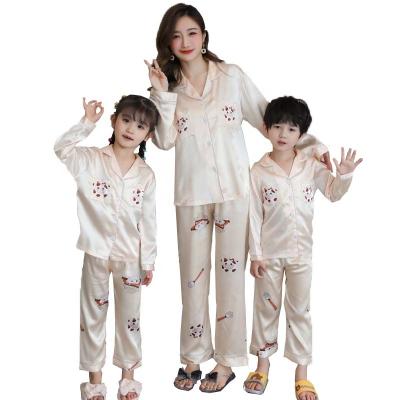 China New Children's Luxury Fashion Women's Pajamas Family Pajamas Sleepwear One Set Cute Cartoon QUICK DRY Cow Smooth for sale