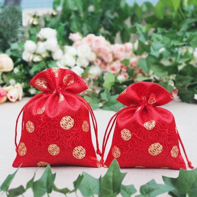 China Funny Recyclable Silk Fabric Gift Packaging Bag for sale